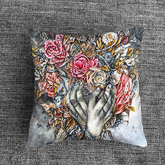 Outdoor pillow with hands, bird and flowers